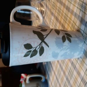 Cypress Home travel mug with bird motif